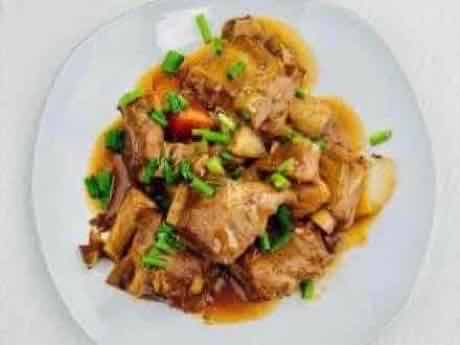 Braised pork ribs in savory soy glaze
