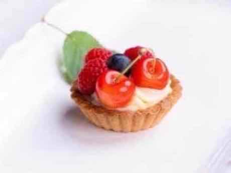 Fruit tart topped with seasonal fresh fruit