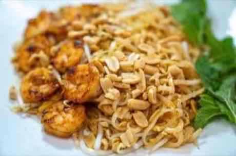 Close-up of shrimp Pad Thai with crushed peanuts
