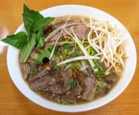 Beef pho with rare steak and brisket in clear broth