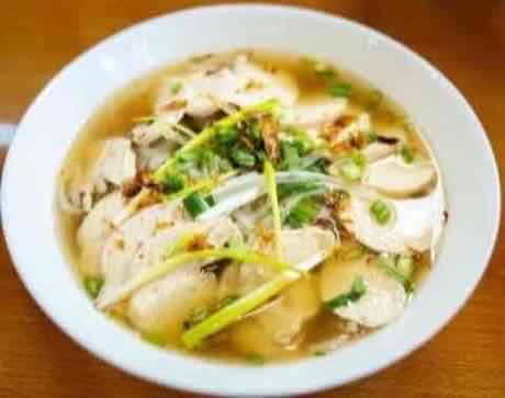 Chicken pho with sliced chicken, scallions and crispy shallots
