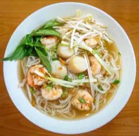 Seafood noodle soup with shrimp, scallops and bean sprouts