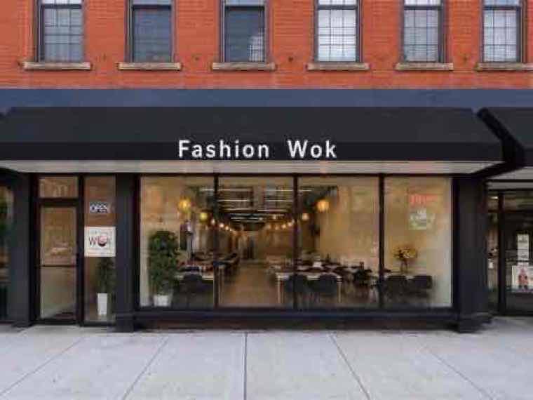 Fashion Wok storefront with black awning and large windows in Middletown, NY